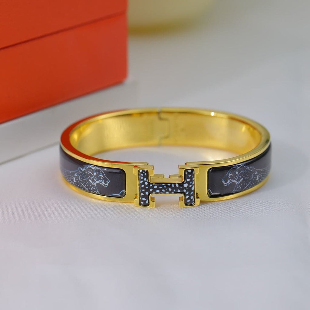 18K Guepards Clic Clac Hermès Bracelet