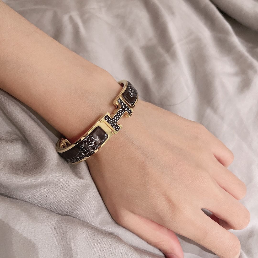 18K Guepards Clic Clac Hermès Bracelet