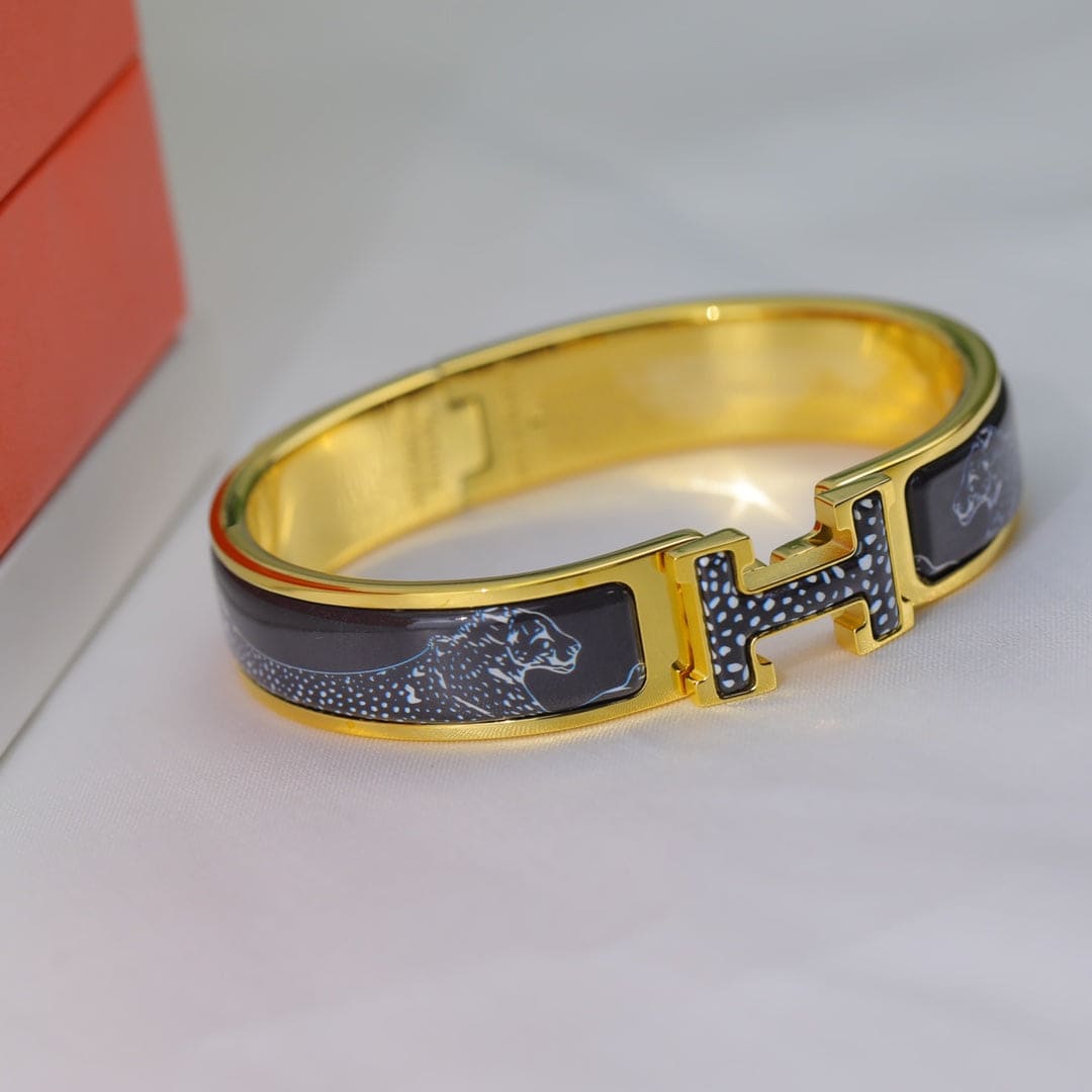 18K Guepards Clic Clac Hermès Bracelet