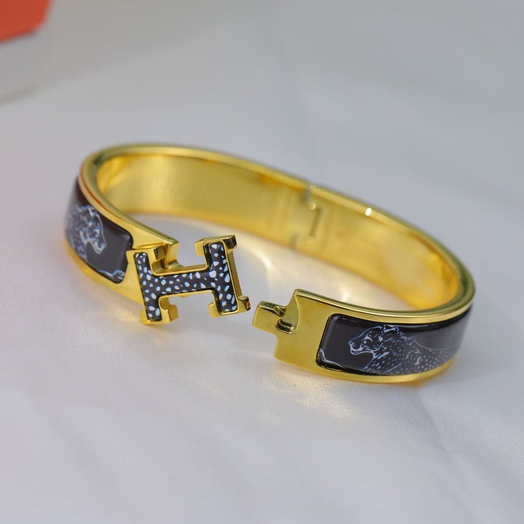 18K Guepards Clic Clac Hermès Bracelet
