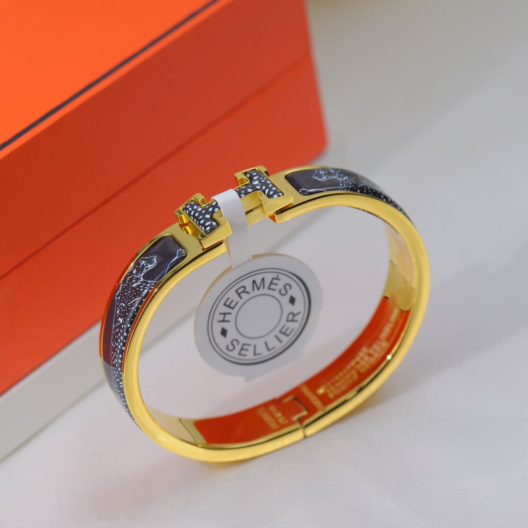 18K Guepards Clic Clac Hermès Bracelet