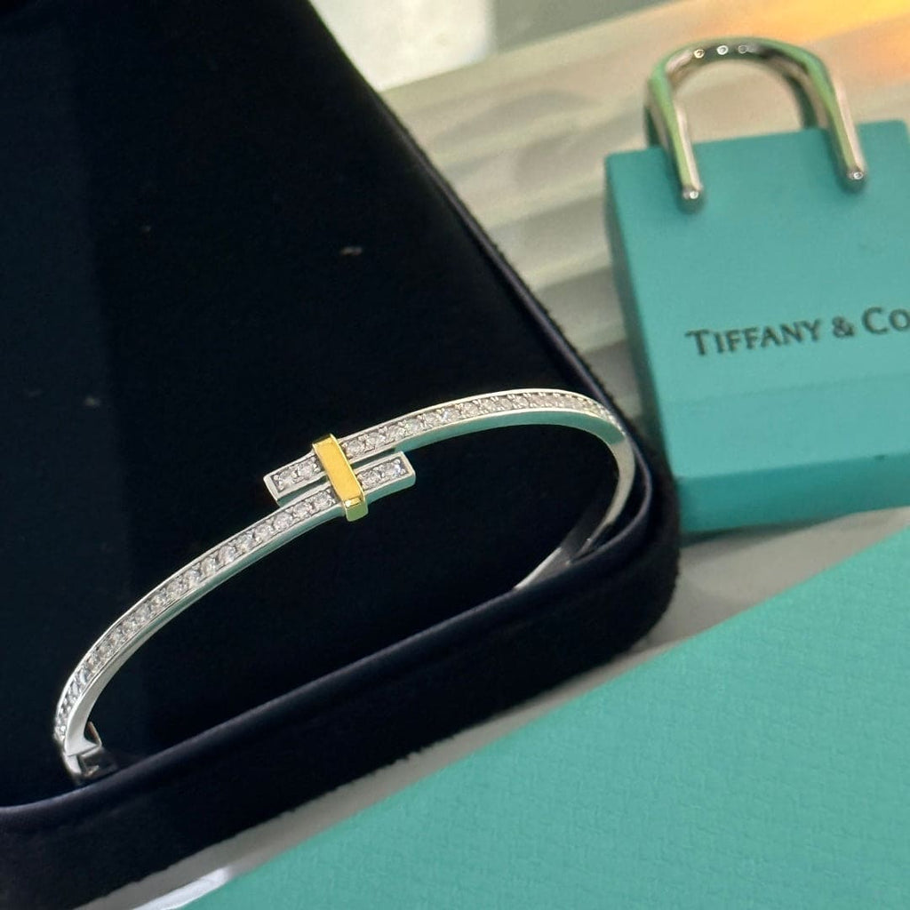 18K Tiffany & Co. Edge Hinged Bypass Bangle Bracelet