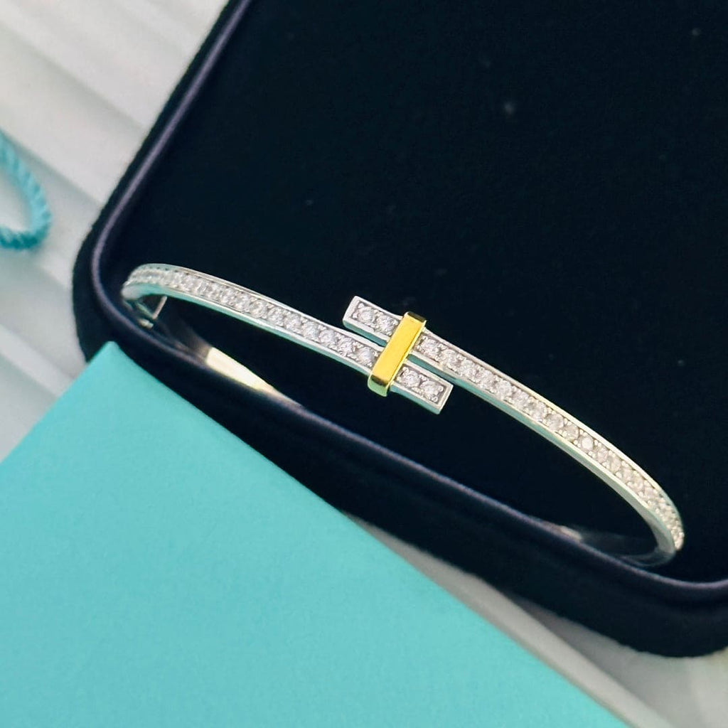 18K Tiffany & Co. Edge Hinged Bypass Bangle Bracelet