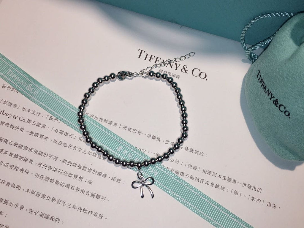 18K Tiffany & Co. Bow Charm Bead Bracelet