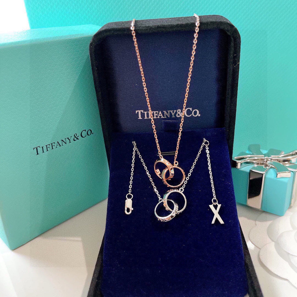 18K Tiffany & Co. Atlas X Closed Interlocking Pendant Necklace