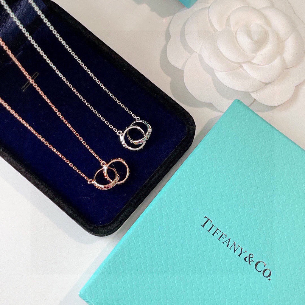 18K Tiffany & Co. Atlas X Closed Interlocking Pendant Necklace