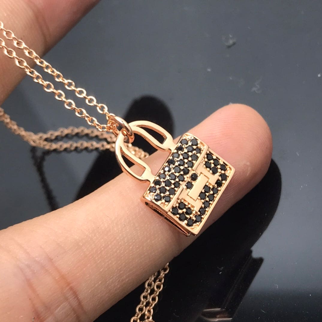 18K Amulettes Kelly Black Diamonds Hermès Necklace