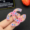 18K Chanel Pink & Black Star Brooch