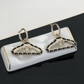 18K Chanel Coat Hanger Earrings
