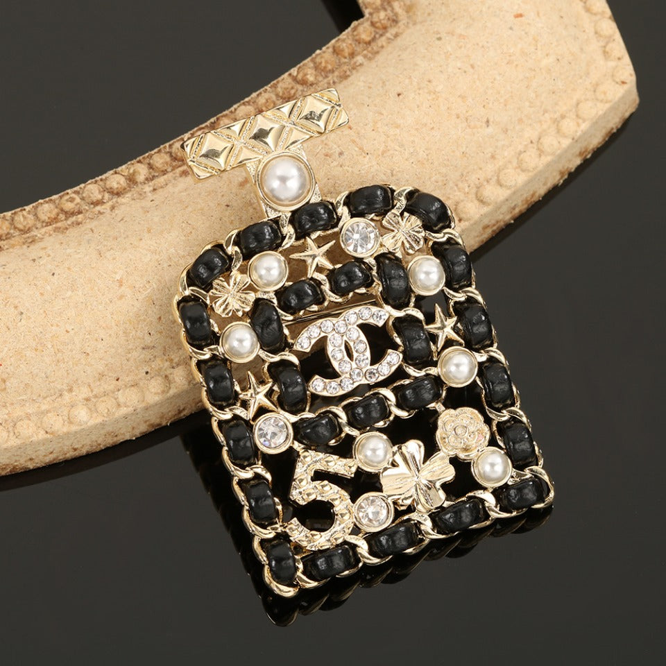 18K Chanel Bottle Strass Brooch