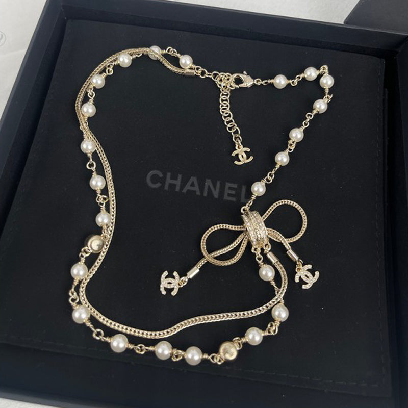 18K Chanel Bow Tie Pearl Necklace