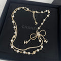18K Chanel Bow Tie Pearl Necklace