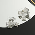 18K Chanel Bow Tie Diamond Earrings