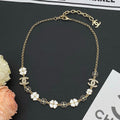 18K Chanel Black & White Camellia Necklace