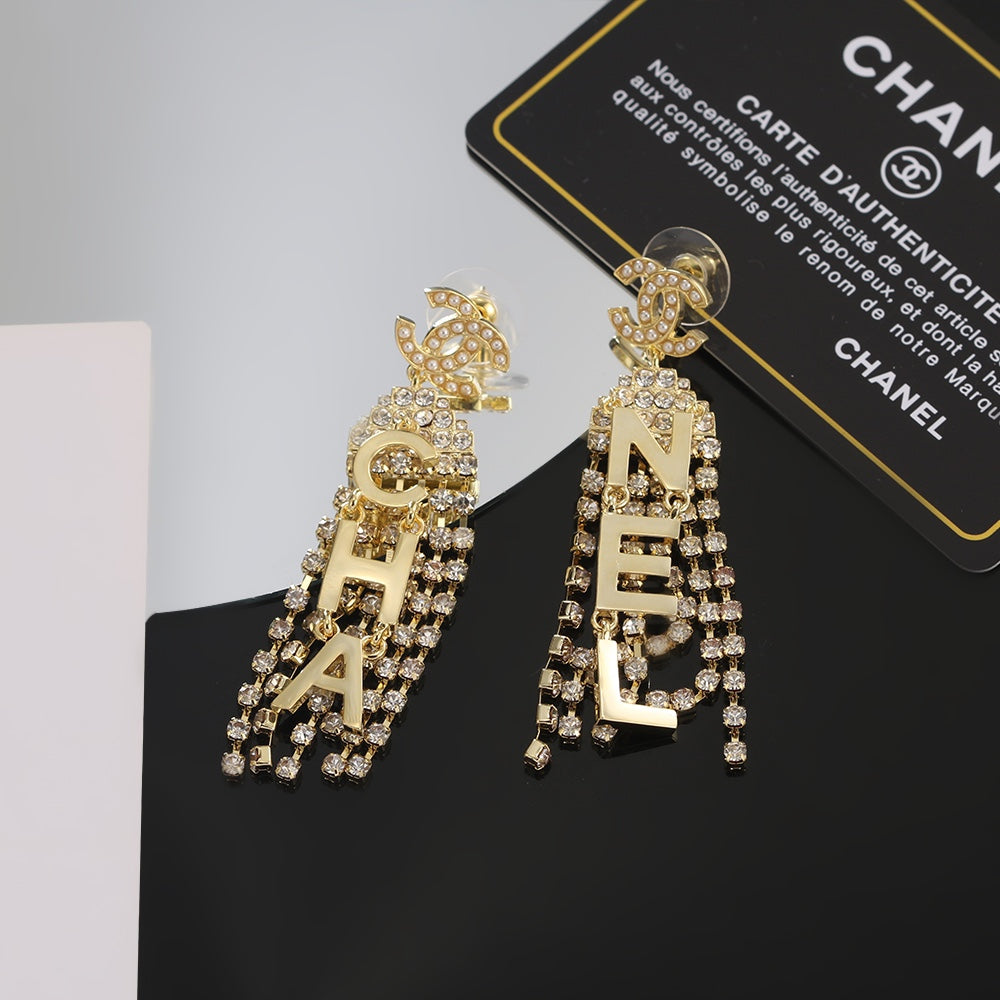 18K Chanel Letter Earrings