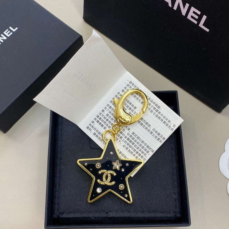 18K Chanel Black Gold Star Brooch