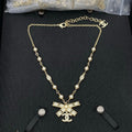 18K Chanel Bow Tie Diamond Gold Necklace