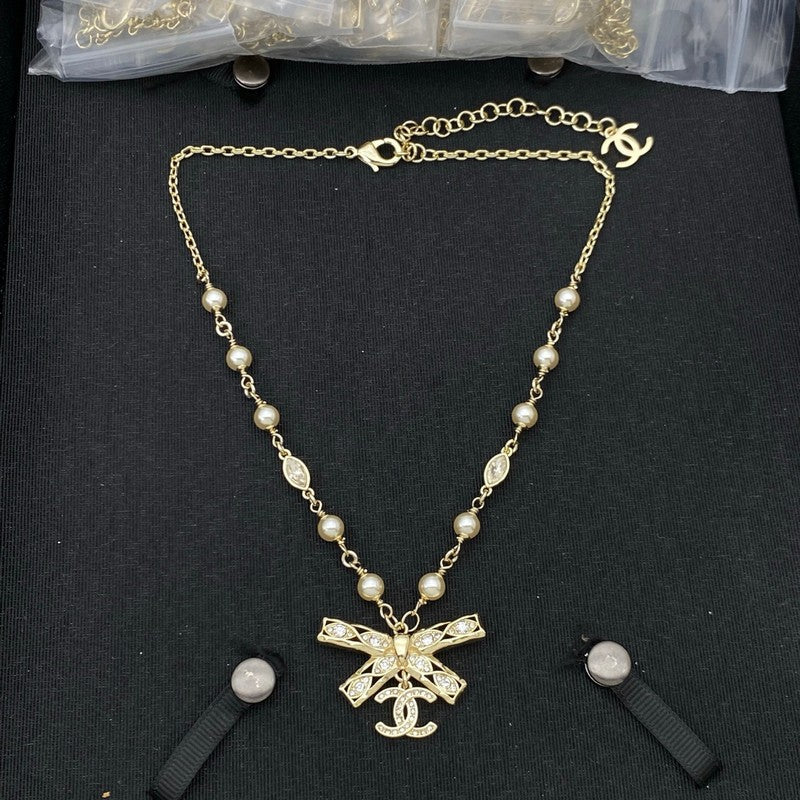 18K Chanel Bow Tie Diamond Gold Necklace