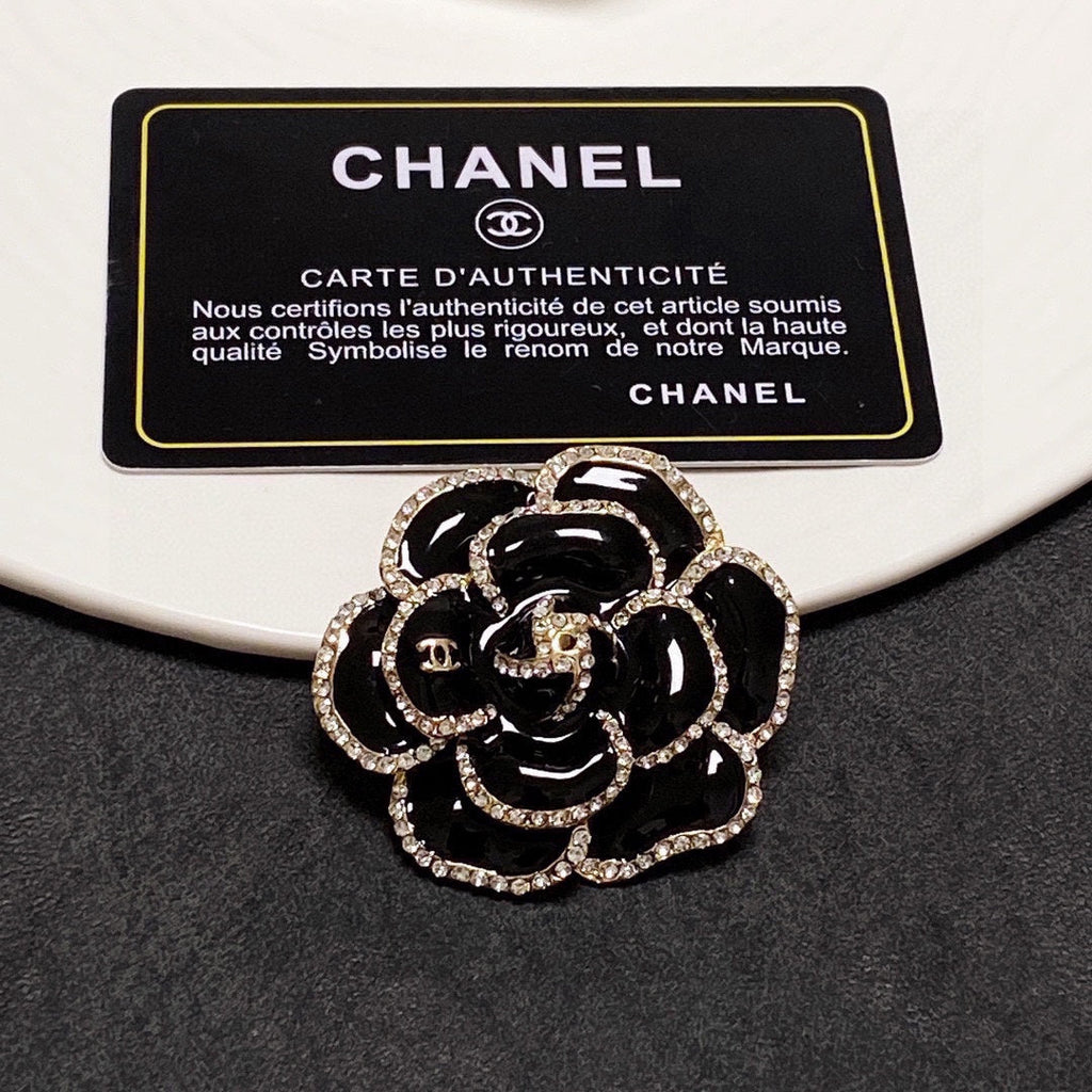18K Chanel Black Flower Brooch