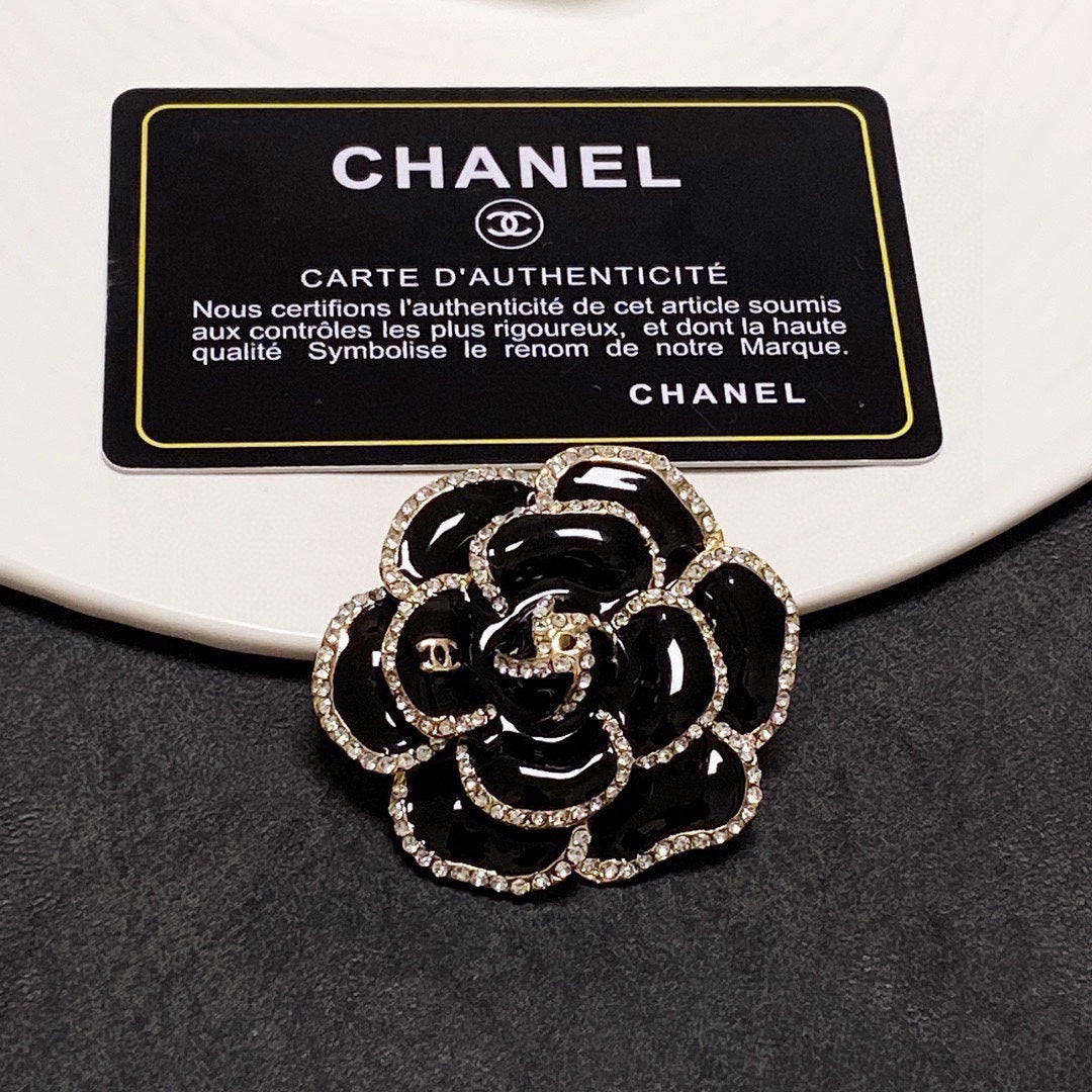 18K Chanel Black Flower Brooch