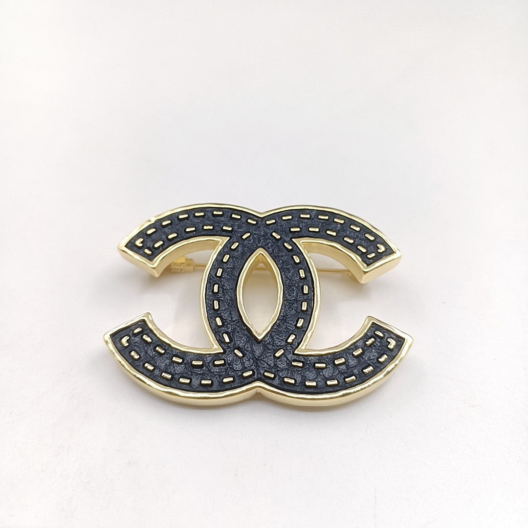 18K Chanel Black Brooch