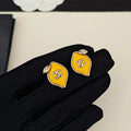 18K Chanel Yellow Leaf Gold Earrings