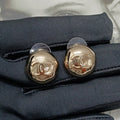 18K Chanel Gold Round Earrings