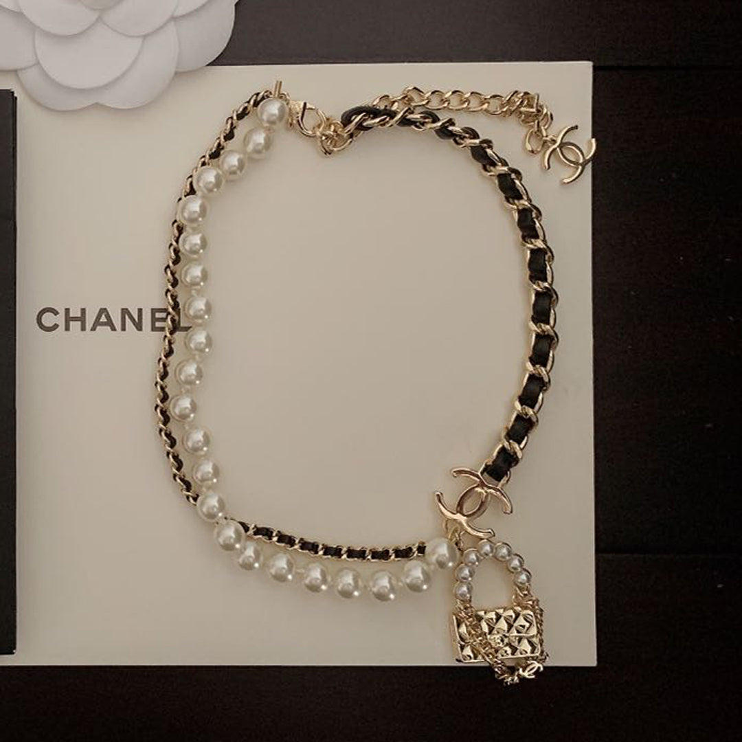 18K Chanel Pearl Leather Bag Pendant Necklace