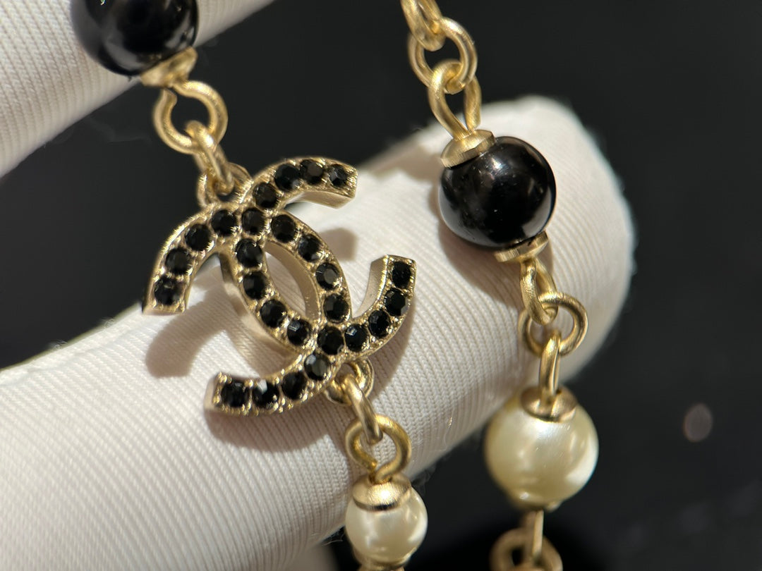 18K Chanel 24S Long Pearls Necklace