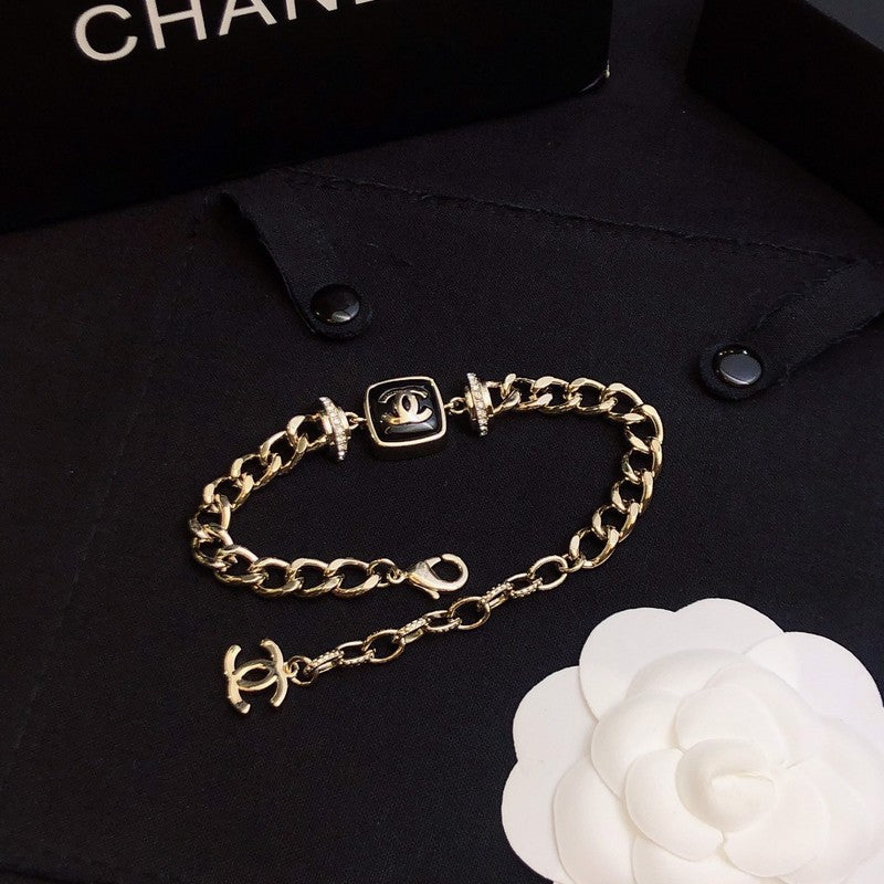 18K Chanel Black Logo Gold Chain Bracelet