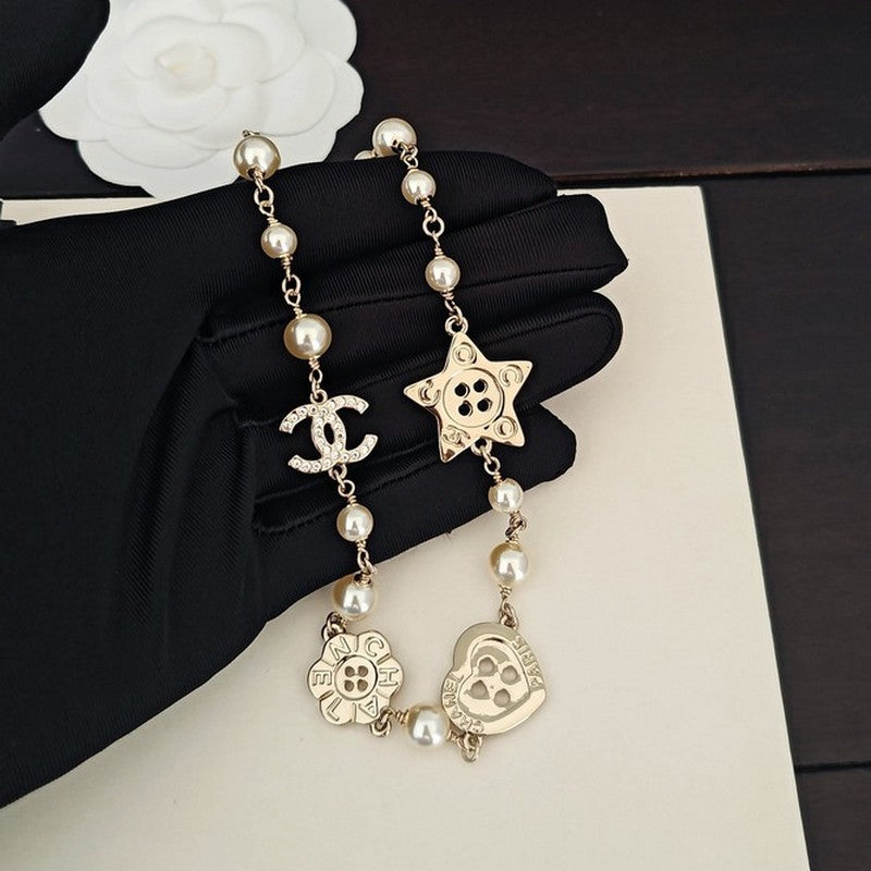 18K Chanel Pearl Star Necklace