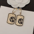 18K Chanel Plate Earrings