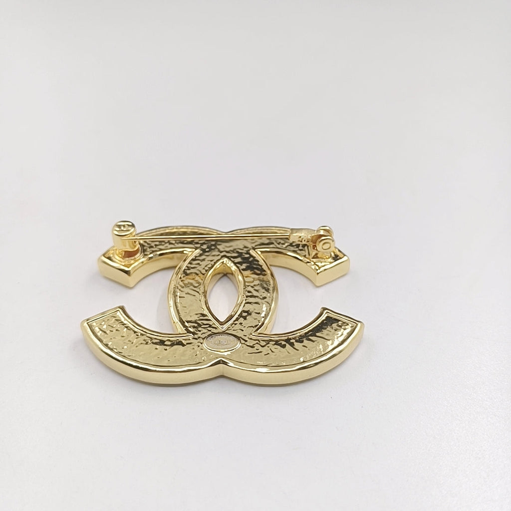 18K Chanel Black Brooch