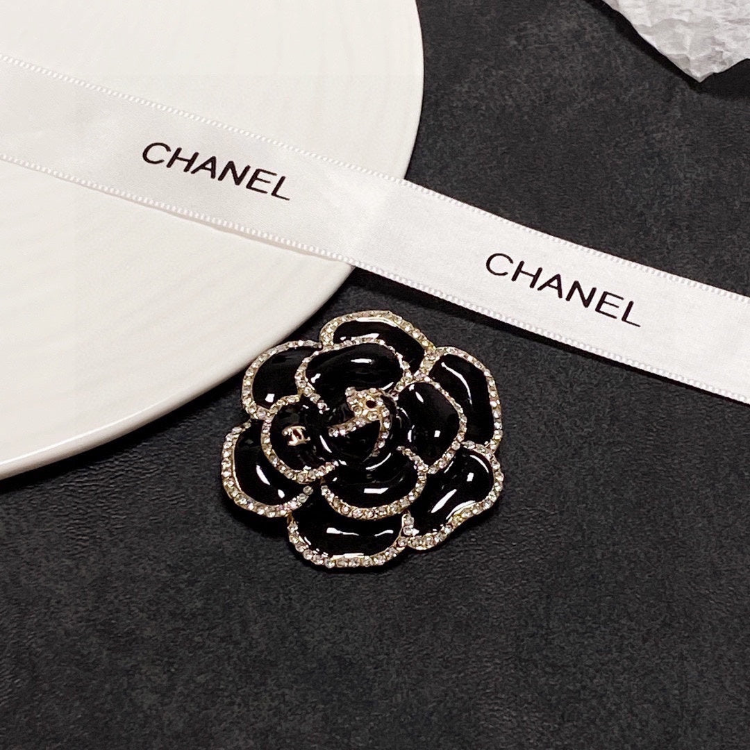 18K Chanel Black Flower Brooch