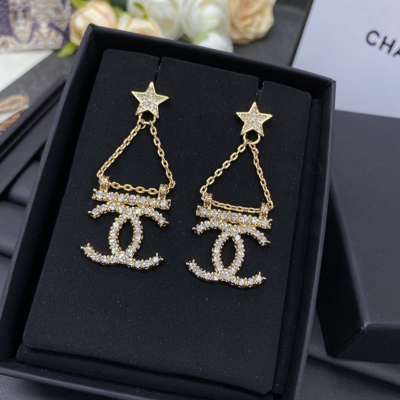 18K Chanel Star Earrings
