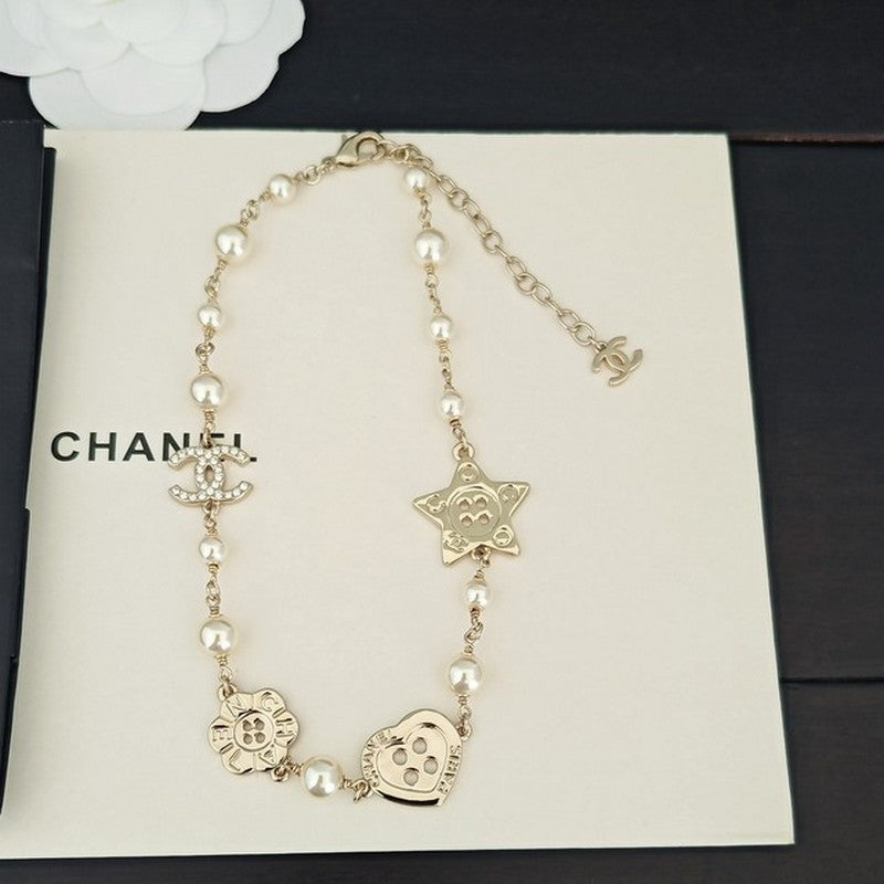18K Chanel Pearl Star Necklace
