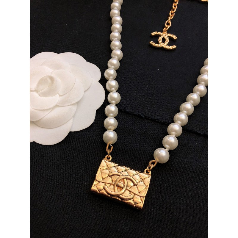 18K Chanel Pearl Bag Pendant Necklace