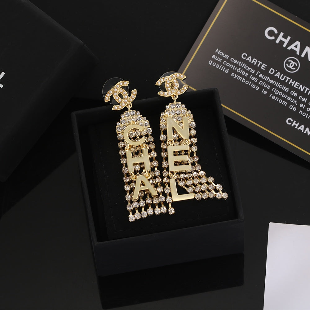 18K Chanel Letter Earrings