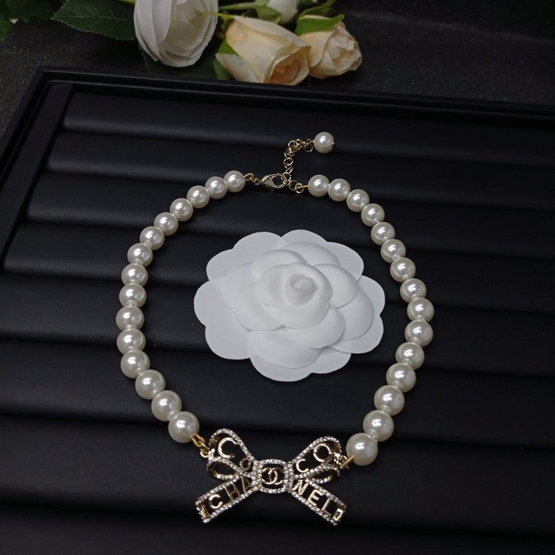 18K Chanel Bow Pearl Necklace