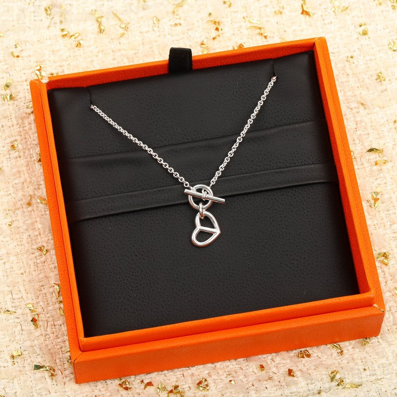 18K Hermès Cache Celine Amulette Pendant Necklace