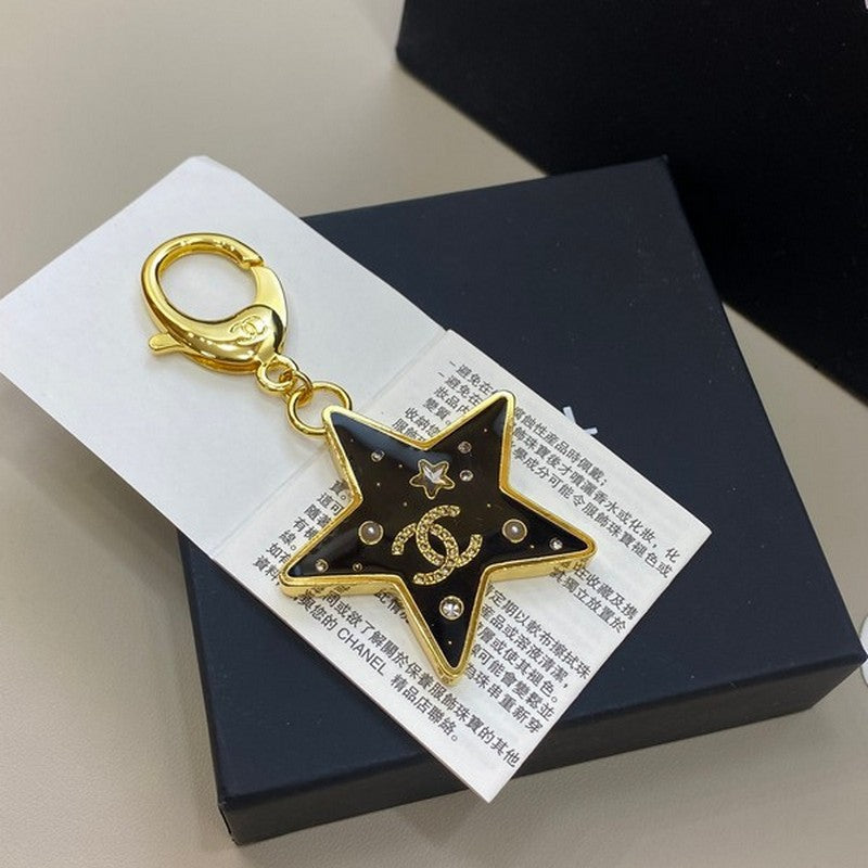 18K Chanel Black Gold Star Brooch