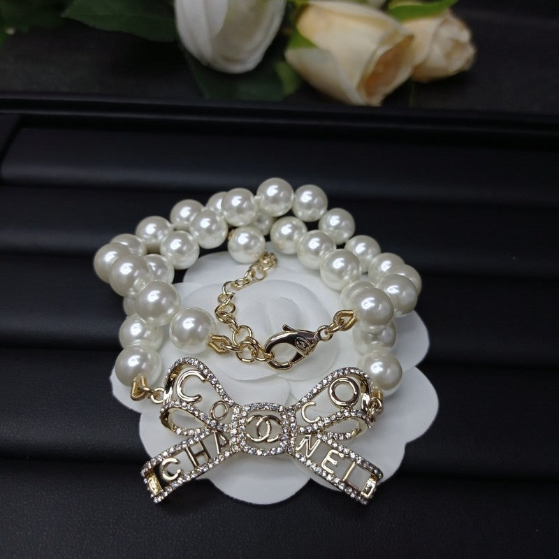 18K Chanel Bow Pearl Necklace