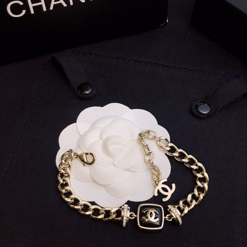 18K Chanel Black Logo Gold Chain Bracelet