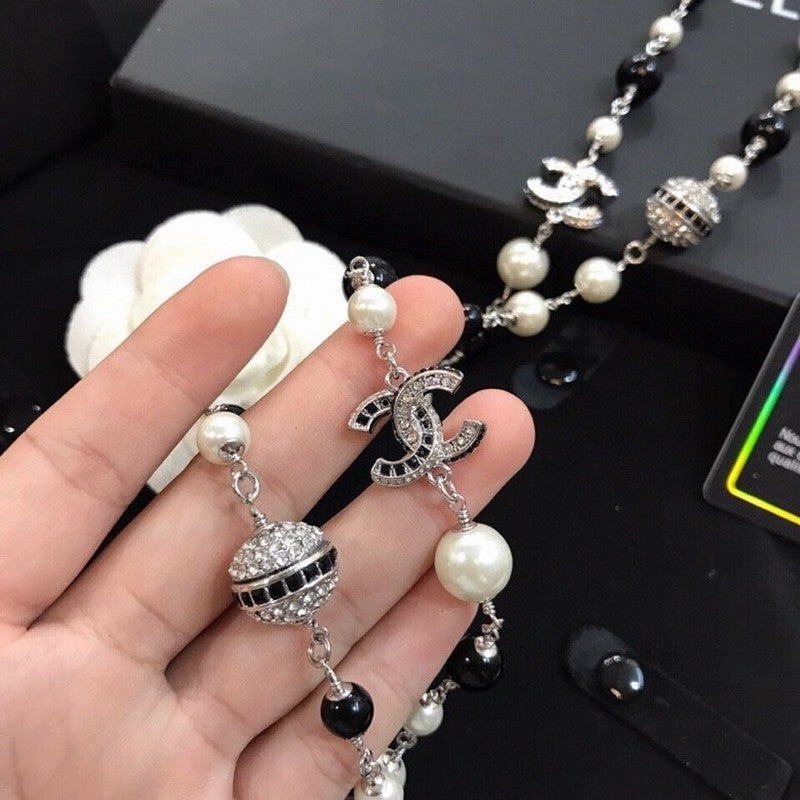 18K Chanel Long Black Pearl Necklace