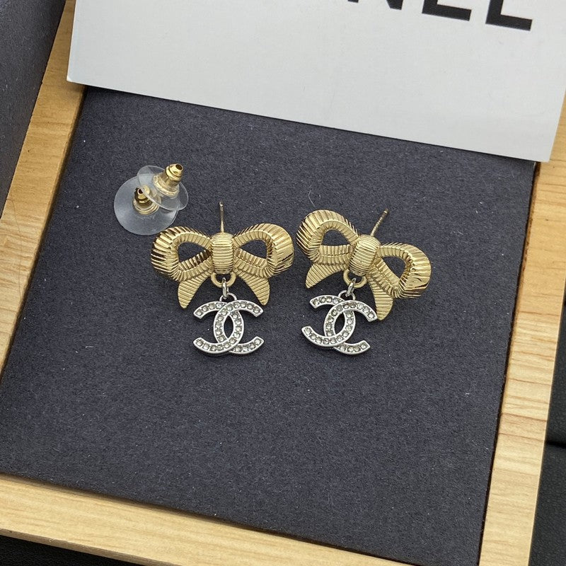 18K Chanel Bow Tie Gold Earrings