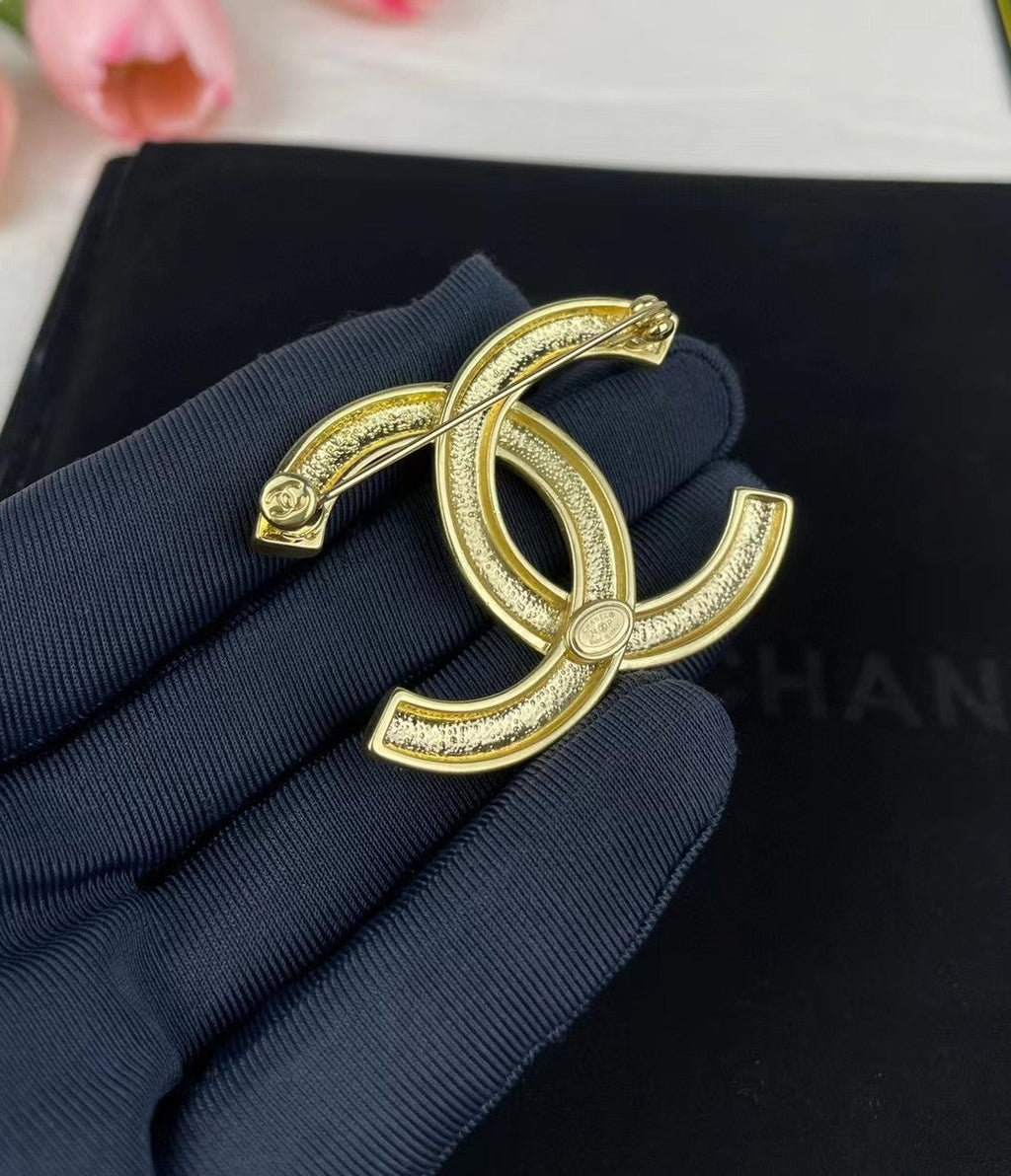 18K Chanel 24S Brooch