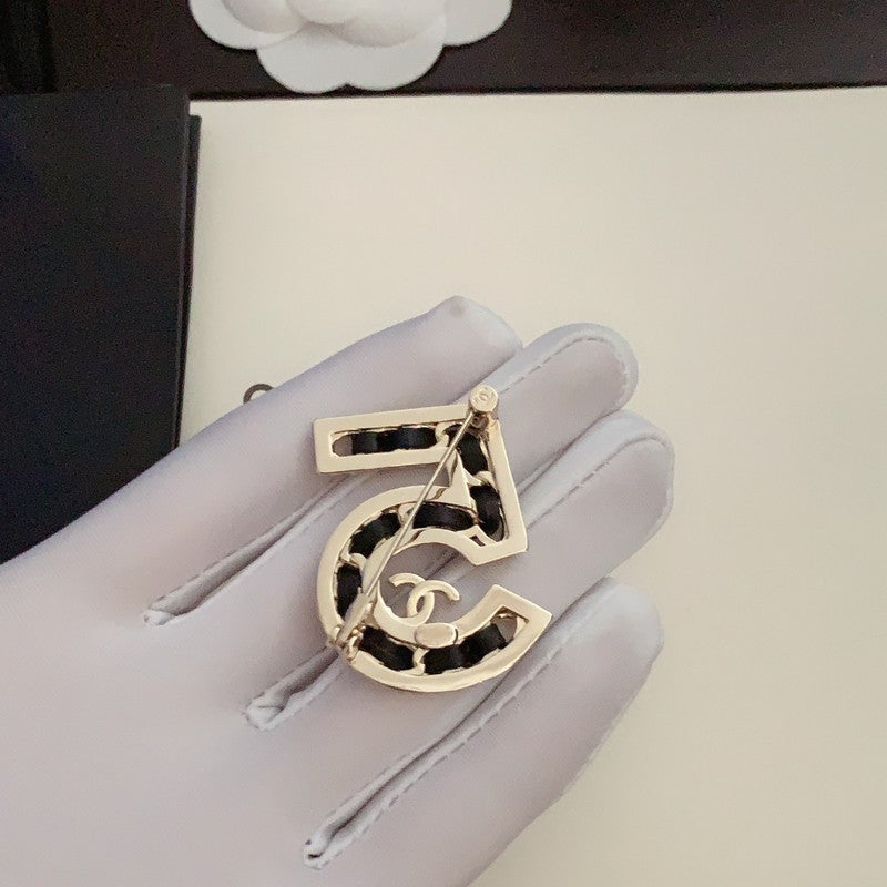 18K Chanel No.5 Leather Diamond Brooch