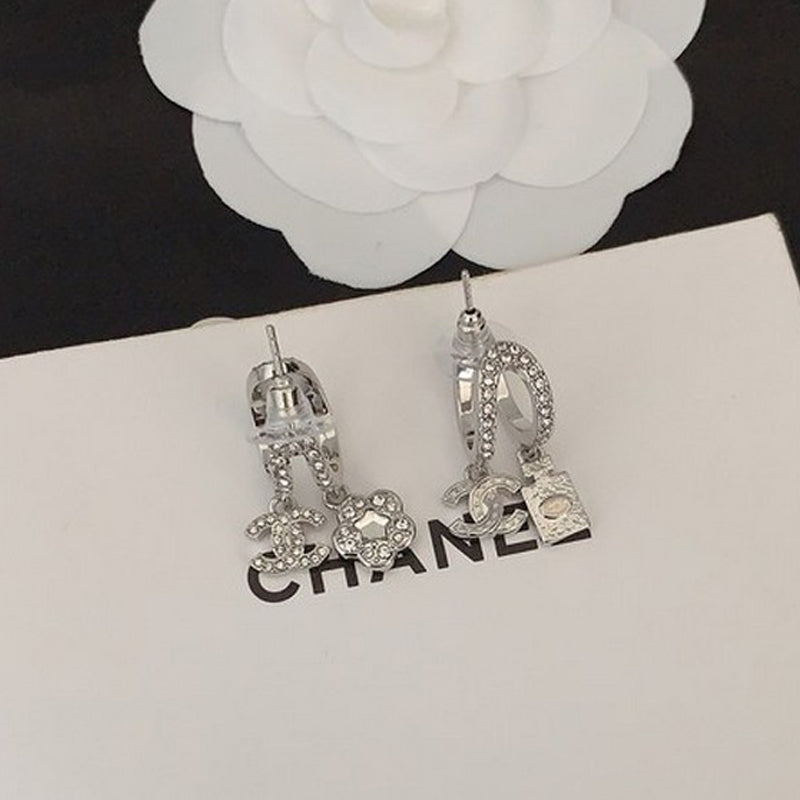 18K Chanel Flower Diamond Earrings
