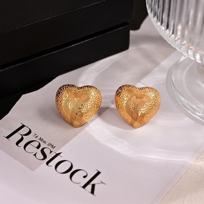 18K Saint Laurent YSL Heart Earrings