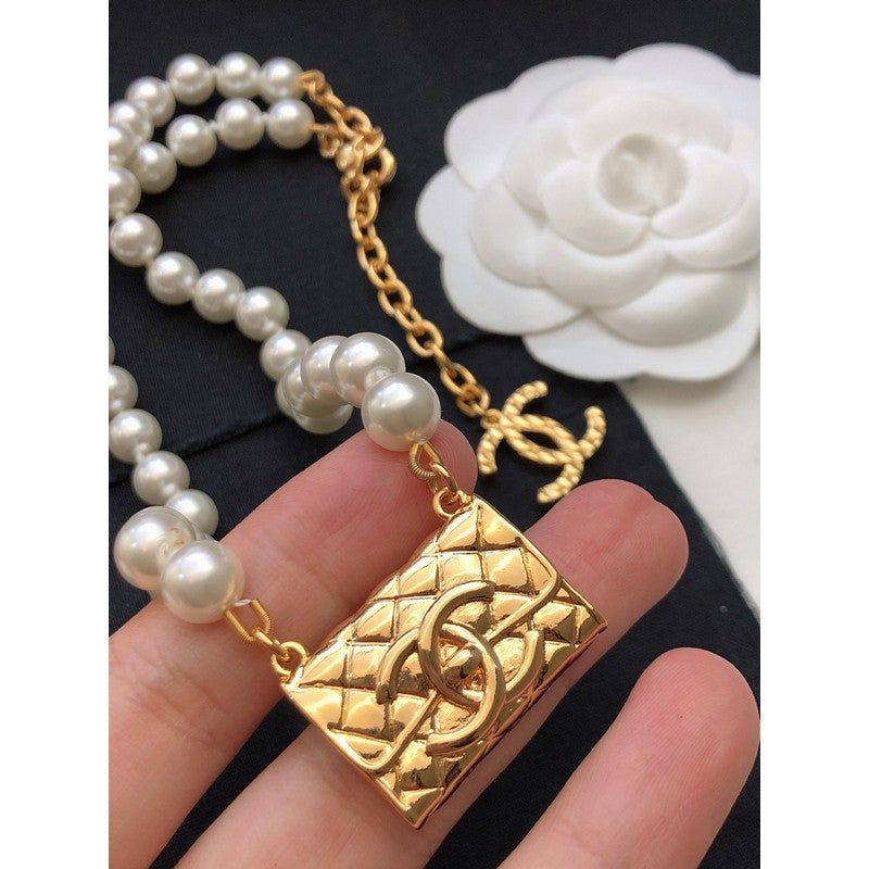 18K Chanel Pearl Bag Pendant Necklace